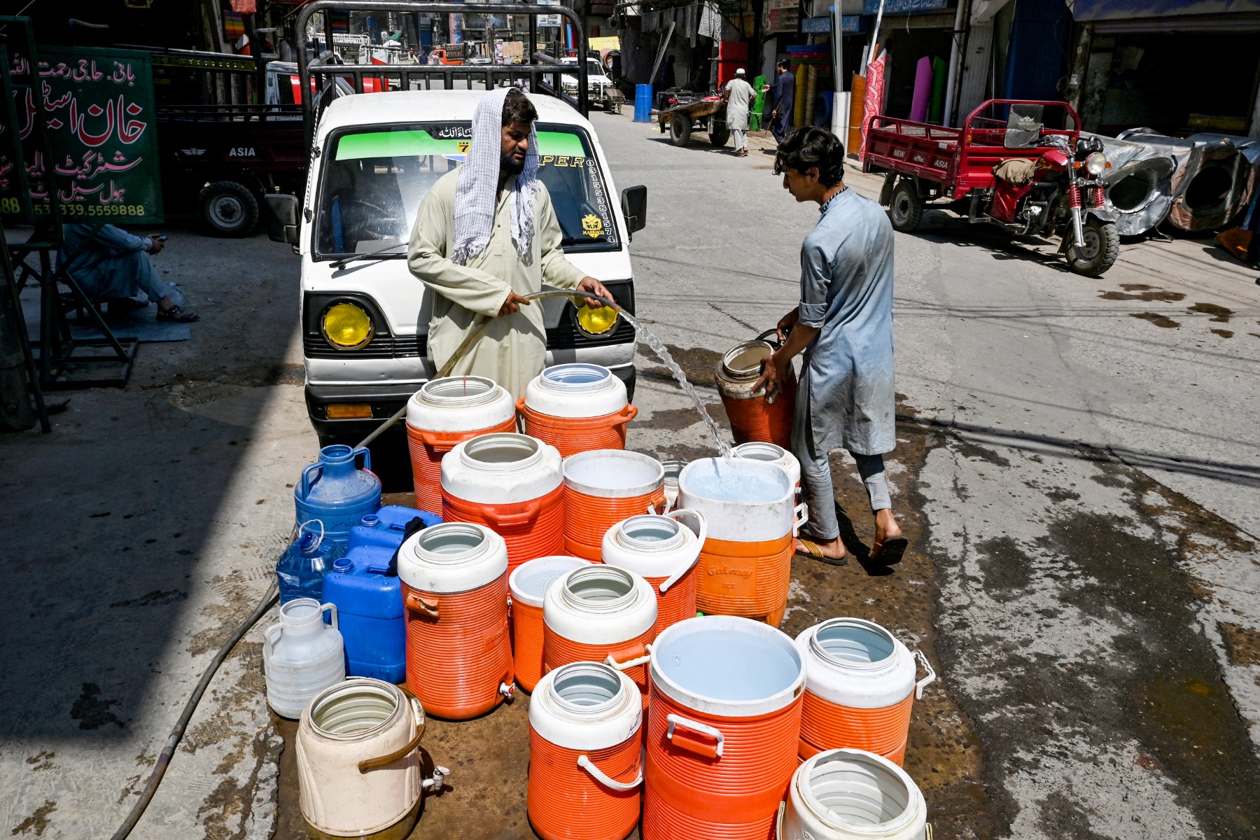 AFP__20240612__34WG3FF__v1__Preview__PakistanClimateWeatherHeat.jpg