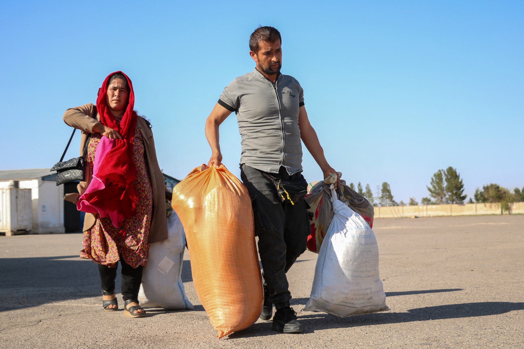 AFP__20240925__36GD82M__v1__MidRes__AfghanistanIranRefugeeRights.jpg