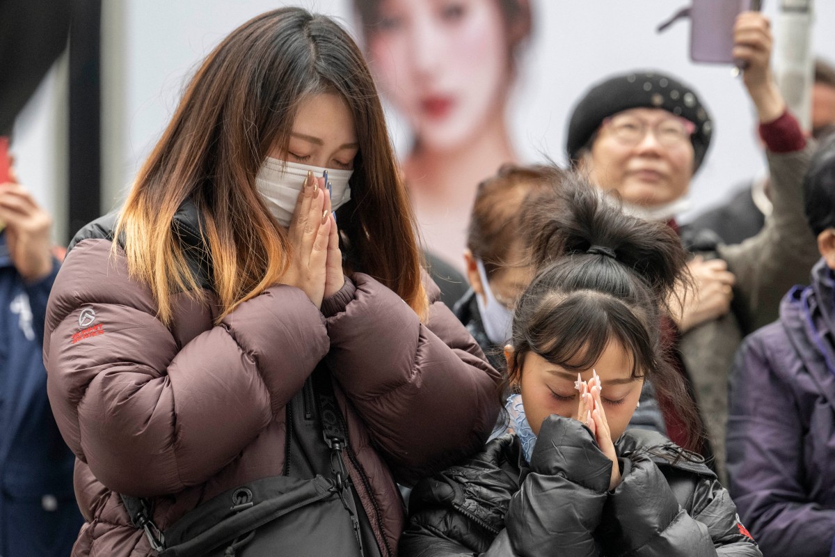AFP__20250311__36ZL3BA__v1__MidRes__JapanDisasterTsunamiAnniversary.jpg