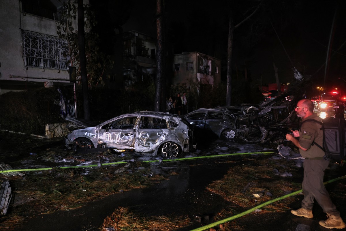 AFP__20250615__62GL43Z__v1__Preview__IsraelIranConflictPalestinian.jpg