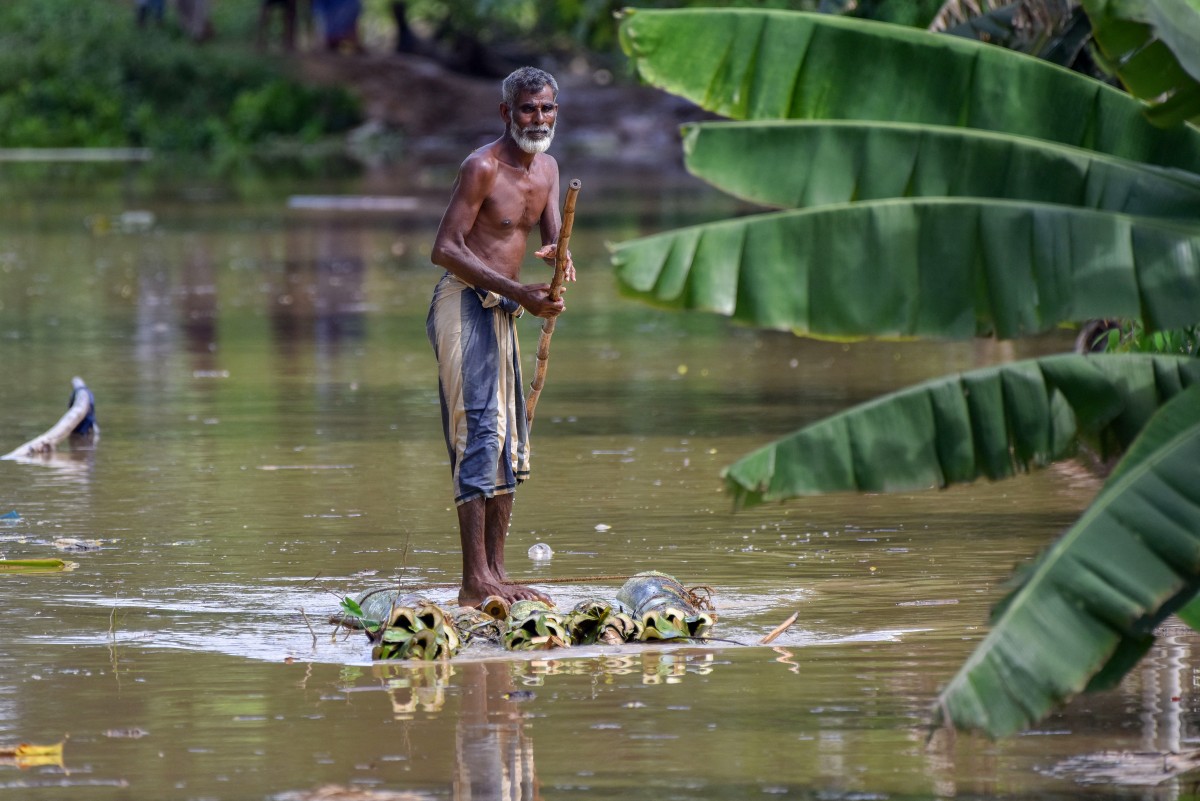 AFP__20250707__66277N2__v3__MidRes__TopshotIndiaWeatherFlood.jpg