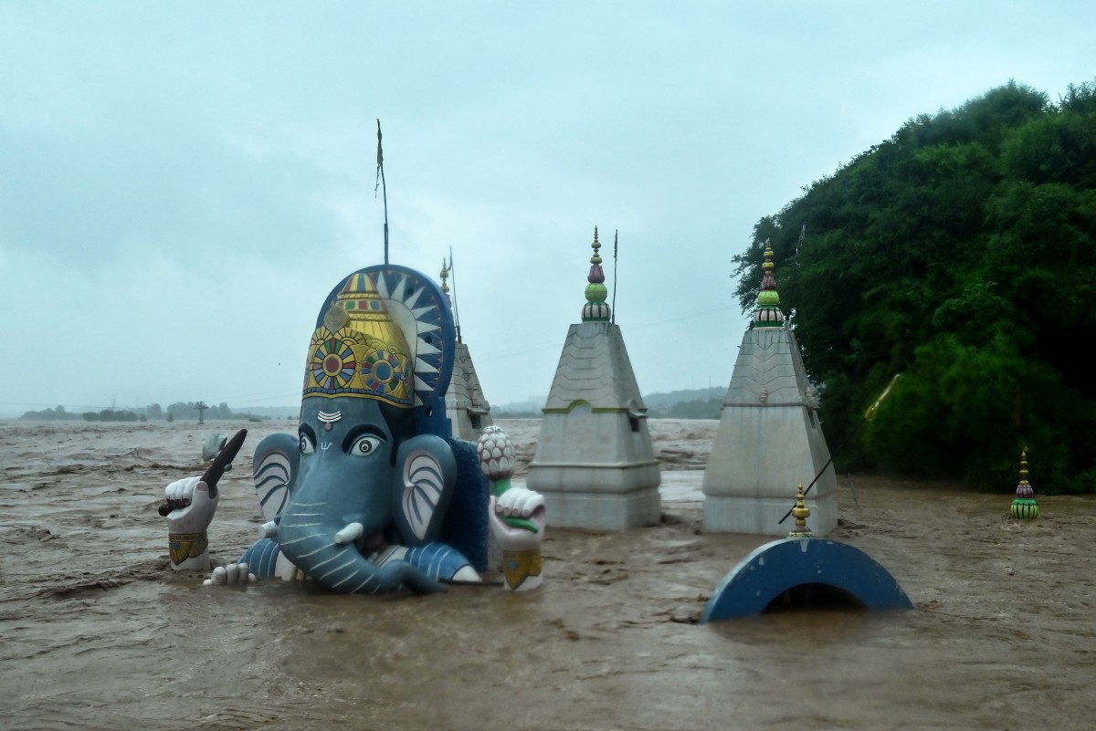 AFP__20250827__72JQ6CQ__v4__MidRes__TopshotIndiaWeatherFlood.jpg