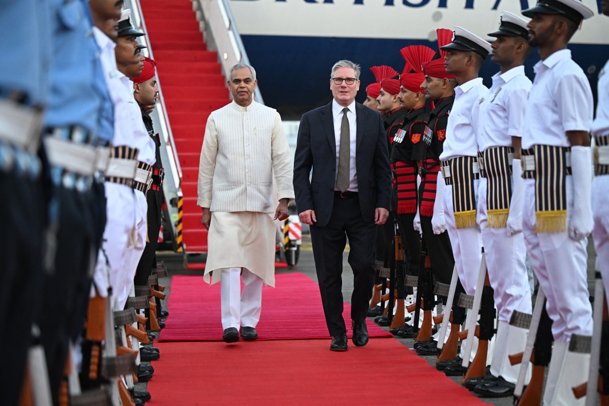 AFP__20251008__78282X4__v6__MidRes__TopshotIndiaBritainDiplomacy.jpg