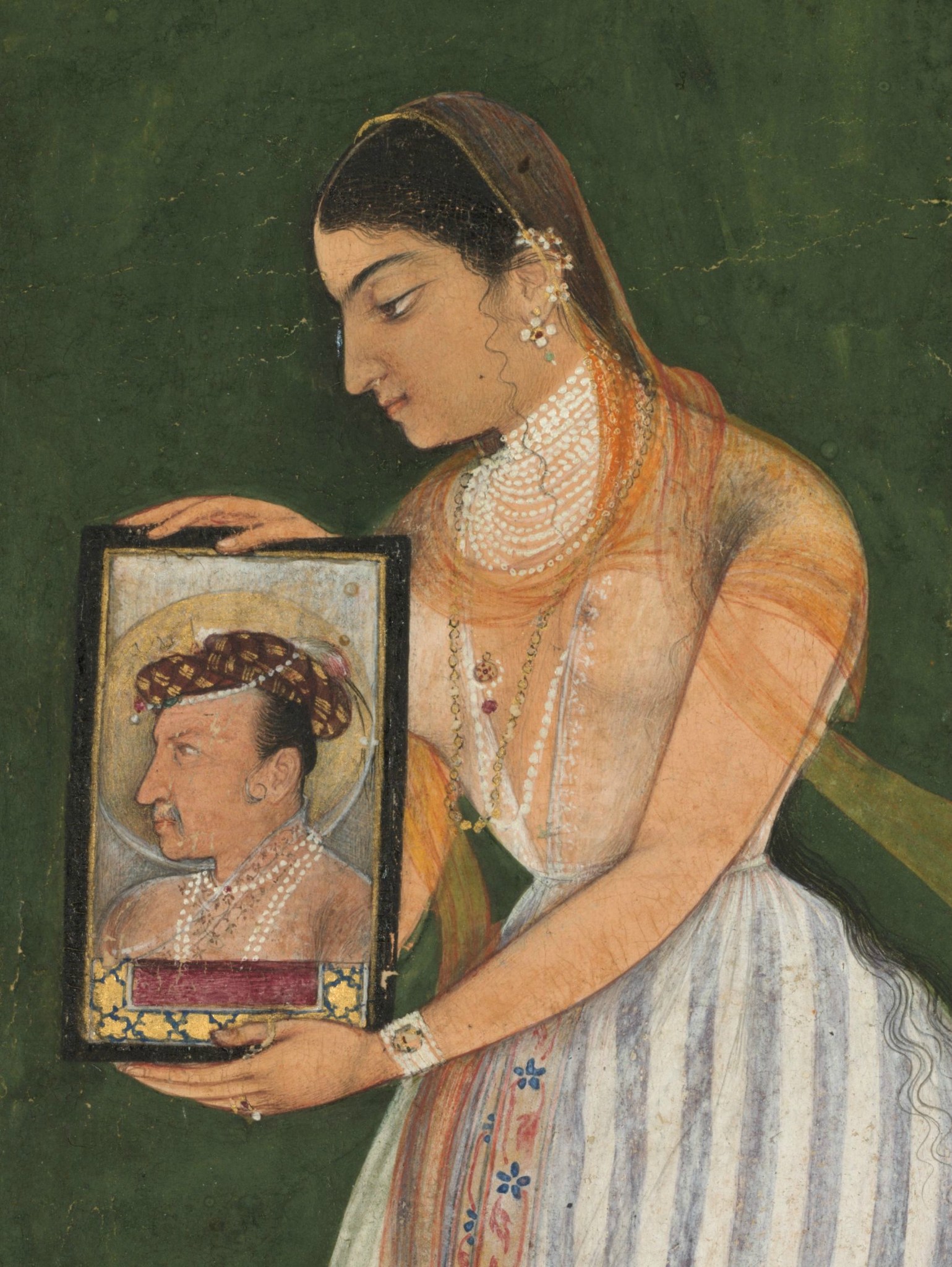 Nur_Jahan_holding_a_portrait_of_Emperor_Jahangir,_about_1627.jpg