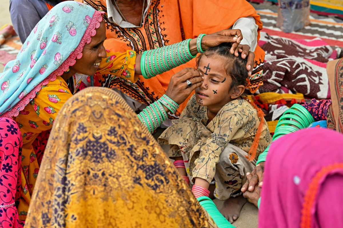 Pakistan Culture Hindusim Tattoos Women.jpg