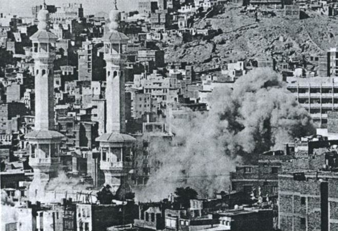 Smoke_rising_from_the_Grand_Mosque,_Mecca,_1979.jpg